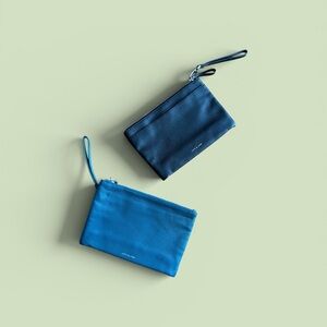 (2) NWOT Love & Lore Wristlets - Black and Teal